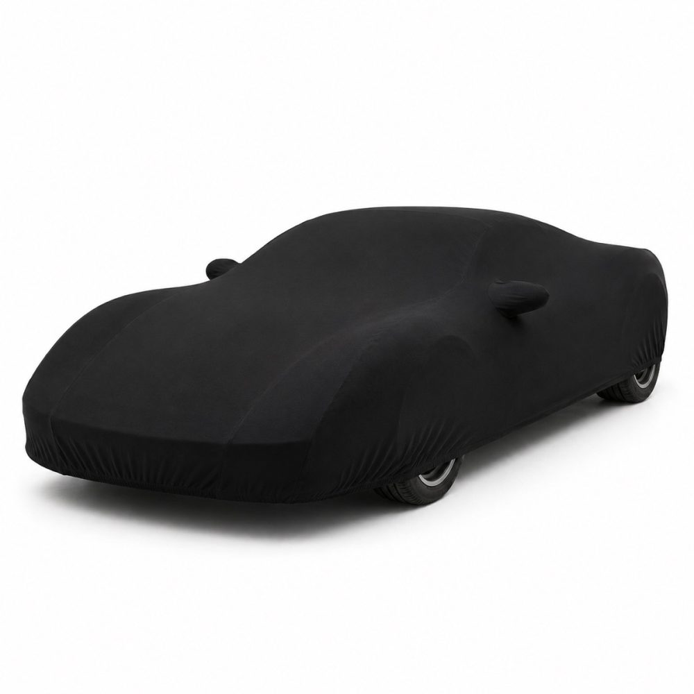 Housse intérieure Jersey Noir pour Ferrari 458 Italia Housse de protection intérieure Jersey noire sur mesure posée sur une Ferrari 458 Italia, vue avant 3/4