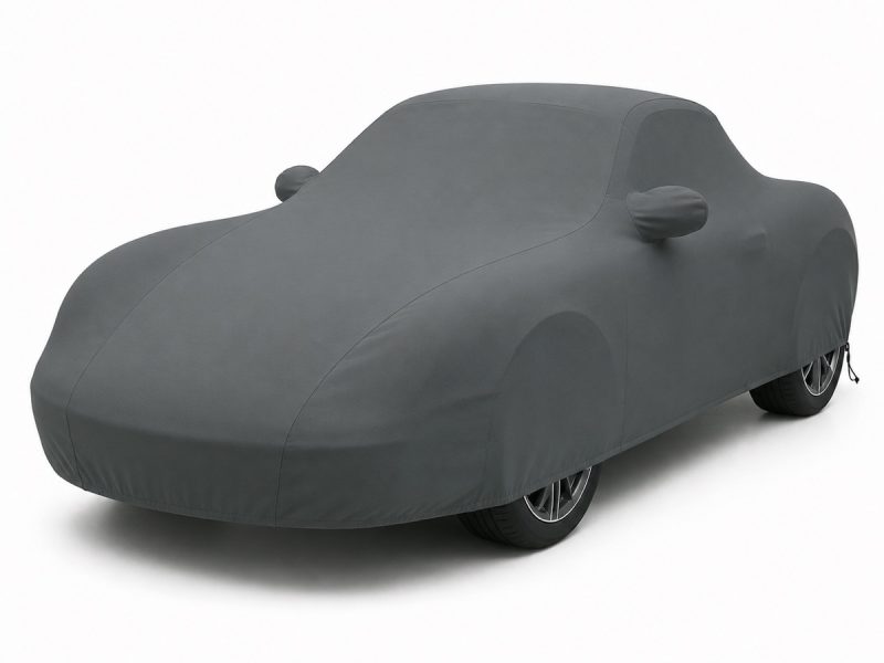 Housse extérieure Urban Gris anthracite pour Porsche Boxster (987) Housse de protection extérieure Urban gris anthracite sur mesure posée sur une Porsche Boxster 987, vue avant 3/4