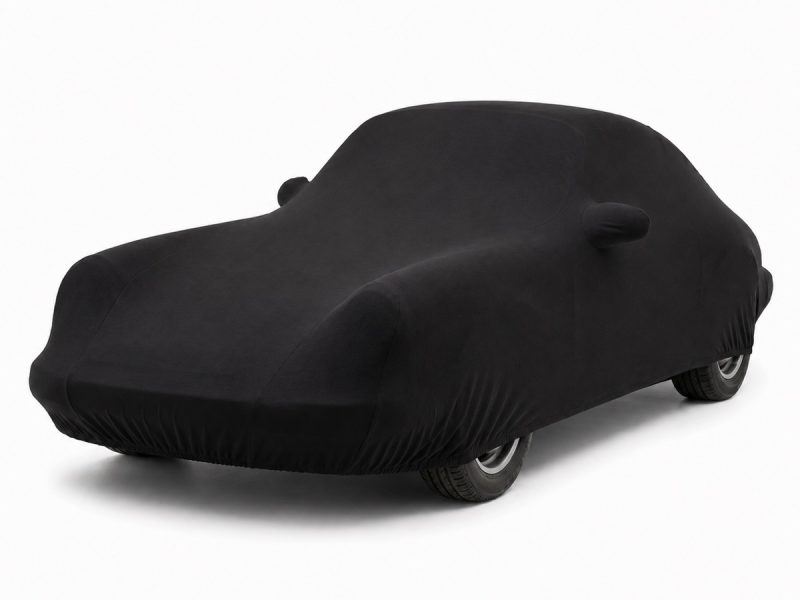Housse de protection intérieure Jersey noire sur mesure posée sur une Porsche 911 Carrera 3.2 Série G, vue avant 3/4