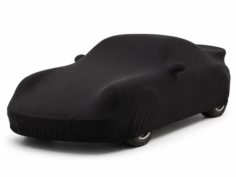 Housse intérieure Jersey Noir pour Porsche 911 GT3 RS (997) Housse de protection intérieure Jersey noire sur mesure posée sur une Porsche 911 GT3 RS 997, vue avant 3/4