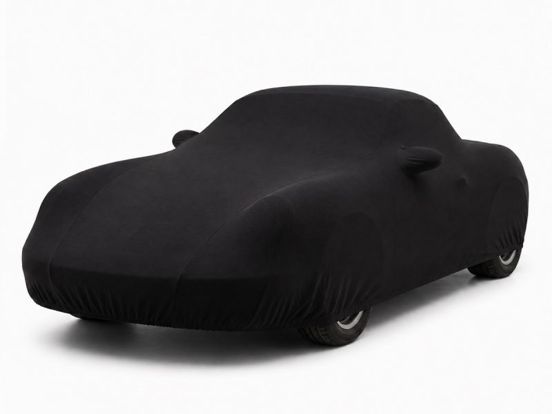 Housse de protection intérieure Jersey noire sur mesure posée sur une Porsche Boxster 986, vue avant 3/4