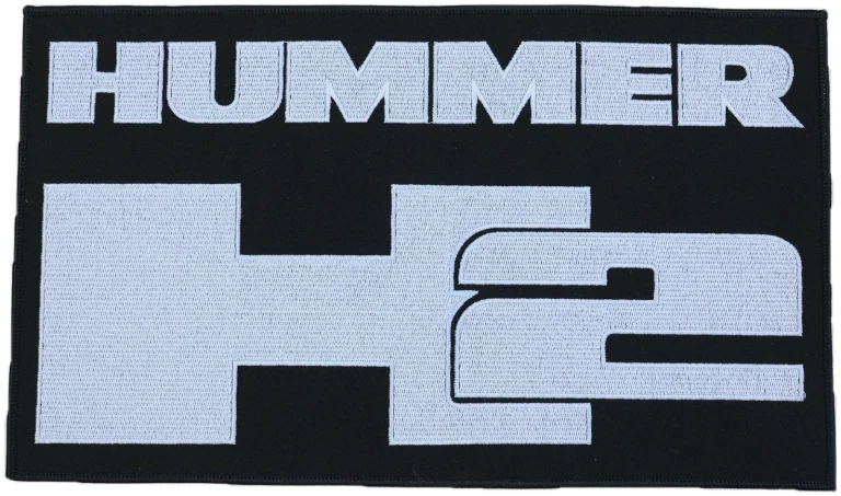 Écusson brodé Hummer à coudre sur une housse de voiture sur mesure