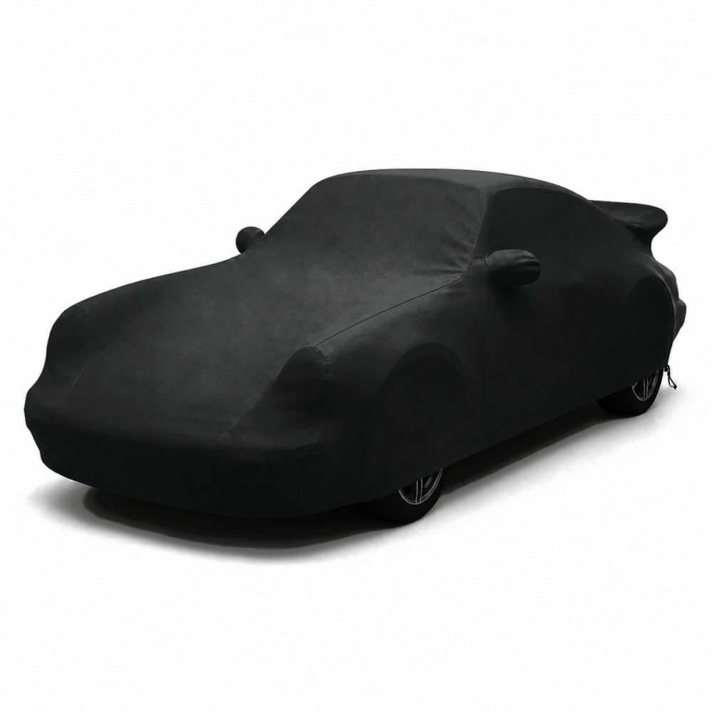 Housse extérieure Urban Noir Porsche 911 Carrera 3.2 « Turbo-Look » (G-Serie) Housse extérieure Urban noire posée sur une Porsche 911 Carrera 3.2 « Turbo-Look » (G-Serie), vue avant trois quarts