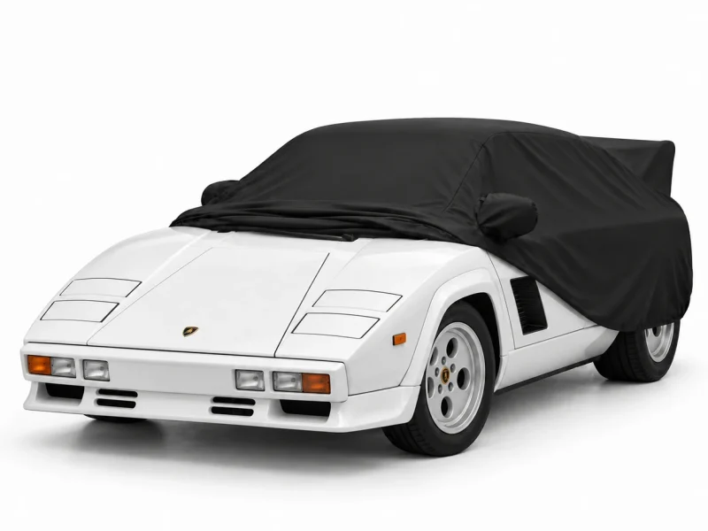 Housse extérieure Urban noire pour Lamborghini LM002 « Rambo Lambo » : housse repliée sur une Lamborghini Countach 5000 Quattrovalvole, avant découvert