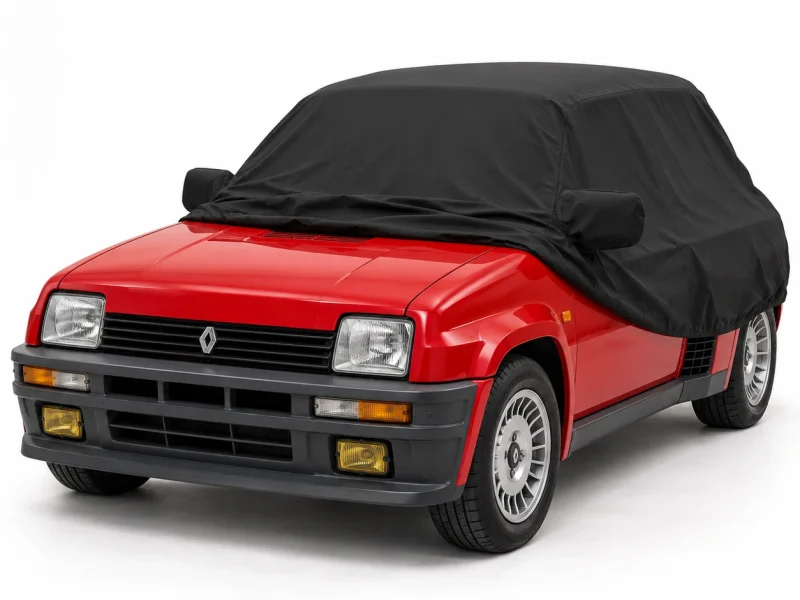 Housse extérieure Urban noire pour Renault Rafale E-Tech : housse repliée sur une Renault 5 Turbo 2, avant découvert